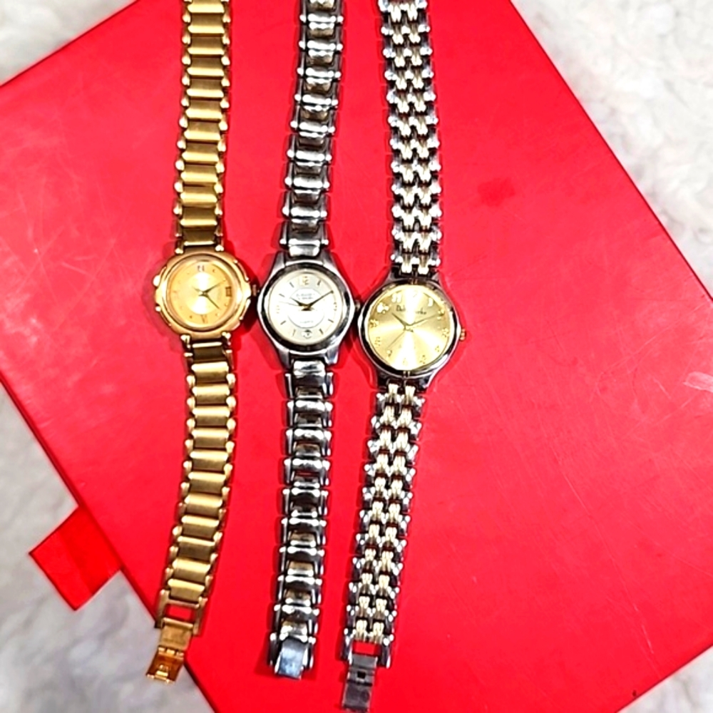 Bundle of Three Vintage Metal Watches Oleg Cassini, Embassy & Delta Burke